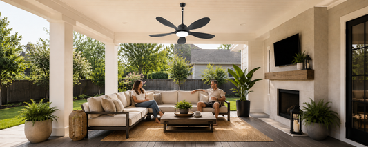 outdoor solar ceiling fan with light on a covered patio above backyard lounge seating