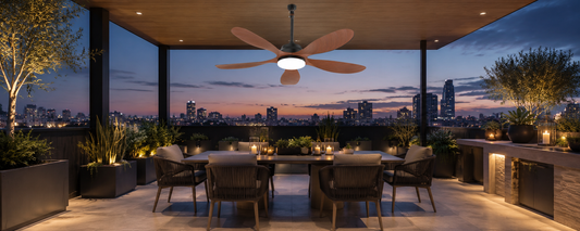 52-inch solar ceiling fan with light above a covered patio dining area after sunset