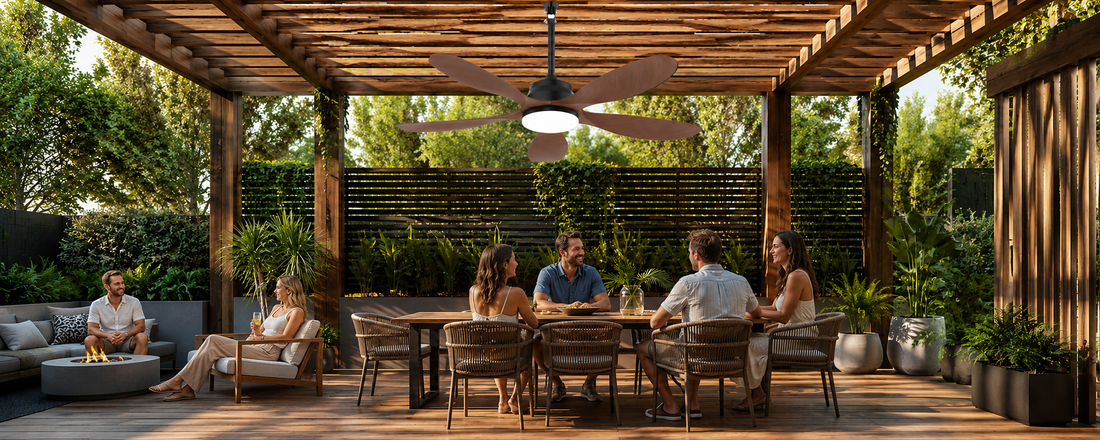 Wood blade solar ceiling fan with light installed over a shaded pergola dining area