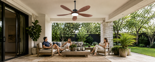 Solar patio fan with light installed above a covered backyard seating area