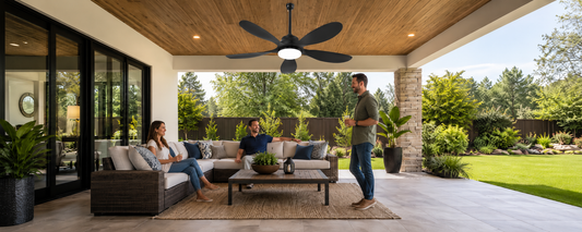 Ventallion solar ceiling fan with light above seating on a shaded covered patio
