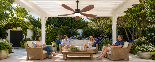 Outdoor fan with light and timer above a covered pergola seating area