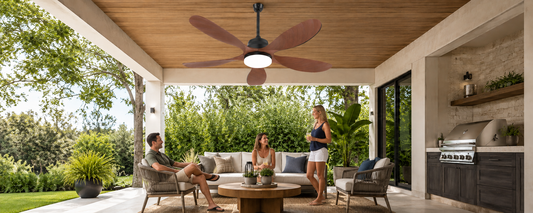 Ventallion solar ceiling fan with wooden blades and LED light installed over a covered patio seating area