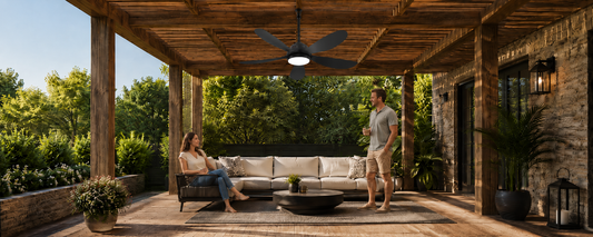 Ventallion black solar fan light installed under a covered pergola for no-wiring outdoor comfort after sunset