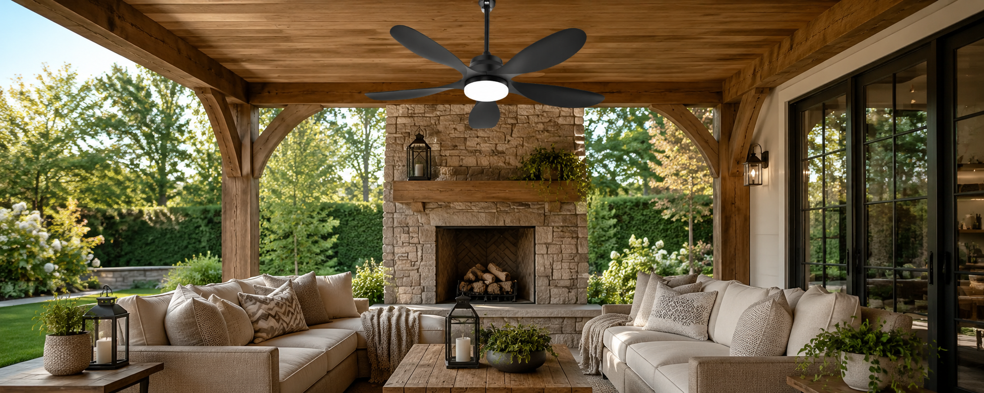 Outdoor solar ceiling fan with LED light for a covered patio and pergola seating area