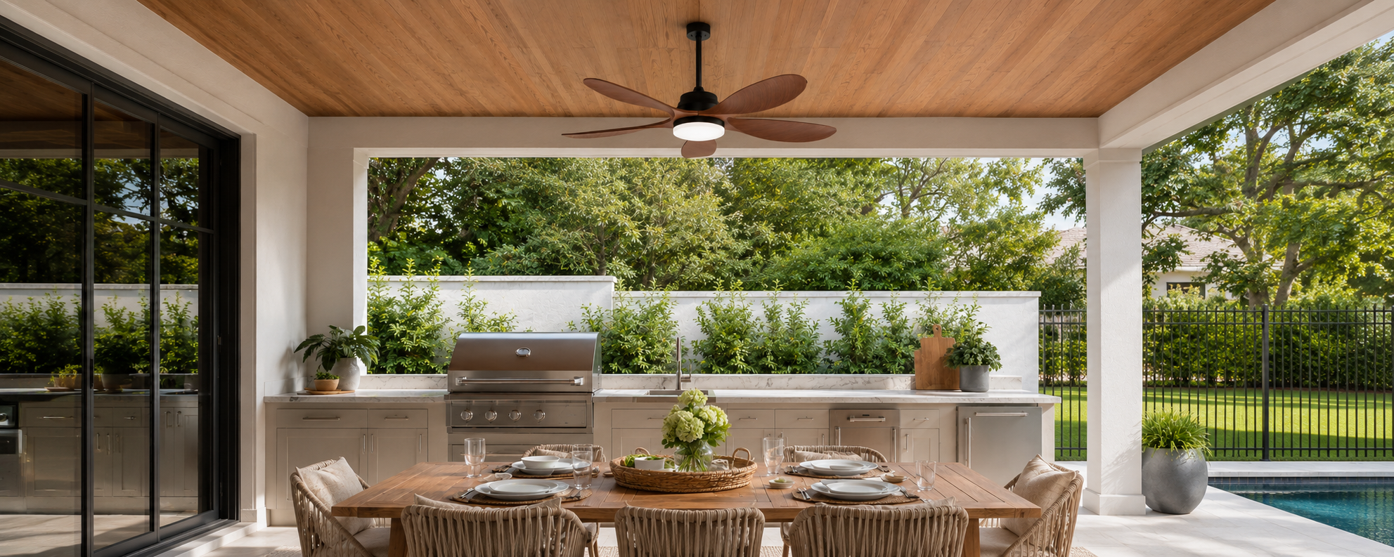 outdoor ceiling fan with light above grill patio dining area