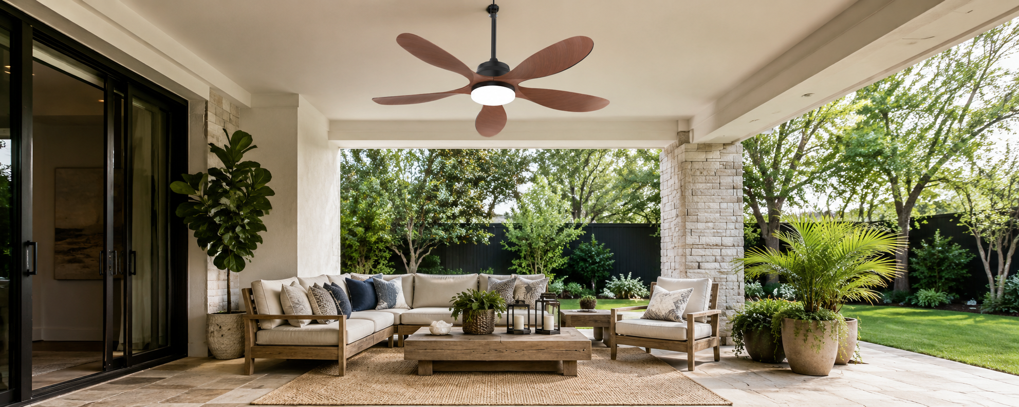 Wood-blade solar patio fan above an open-air covered patio lounge
