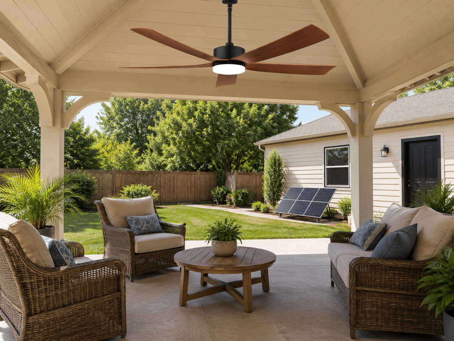 Outdoor gazebo fan and light creating a clean overhead setup without floor fans