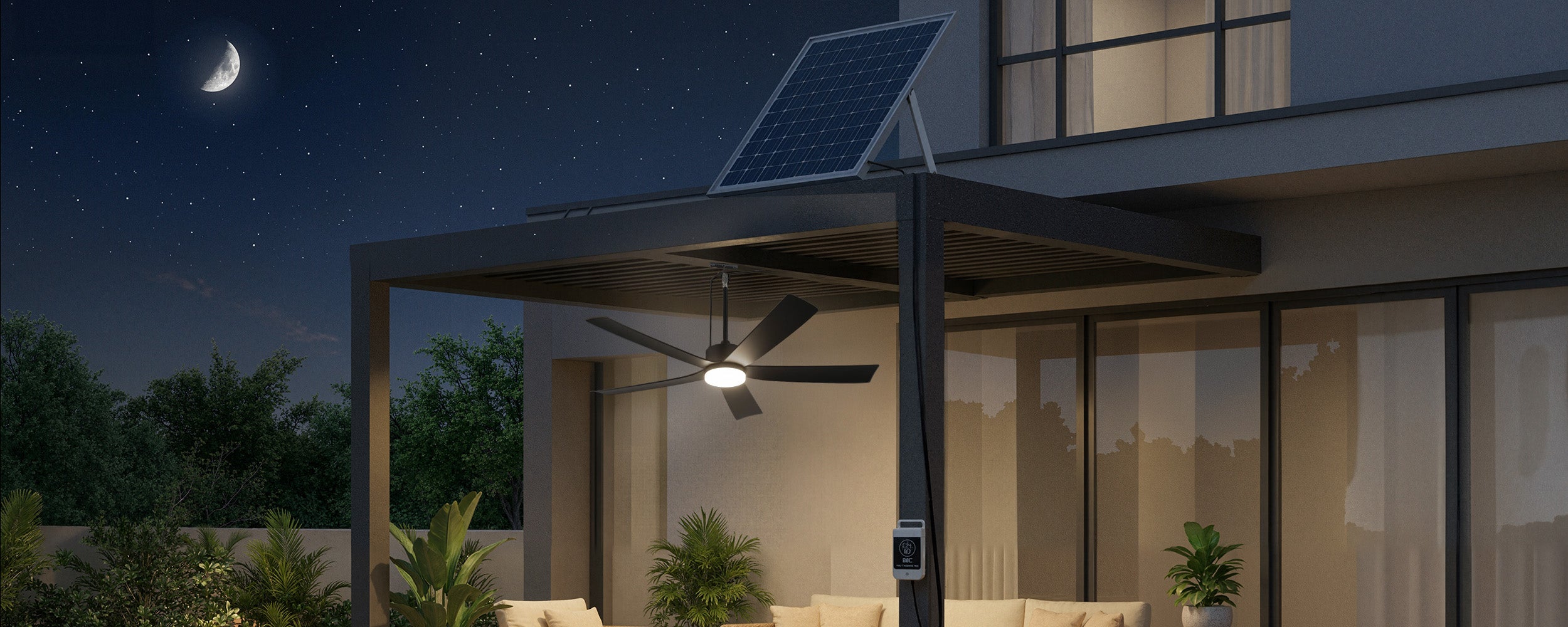 Solar ceiling fan with integrated light in a covered patio at night