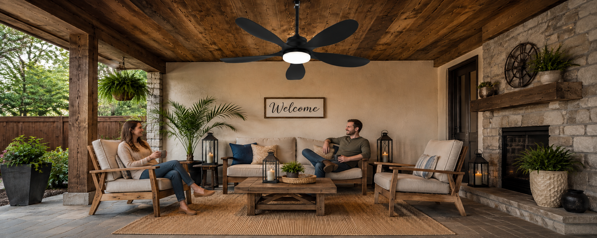 Solar panel positioned in a sunny area outside a shaded pergola with a ceiling fan below