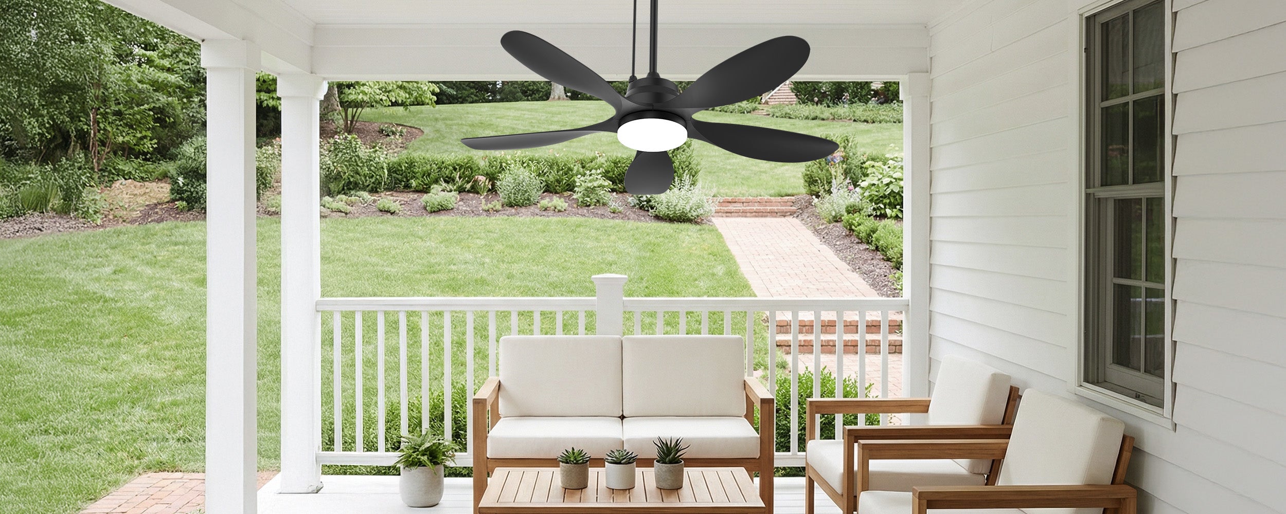 covered porch with a solar ceiling fan and integrated light