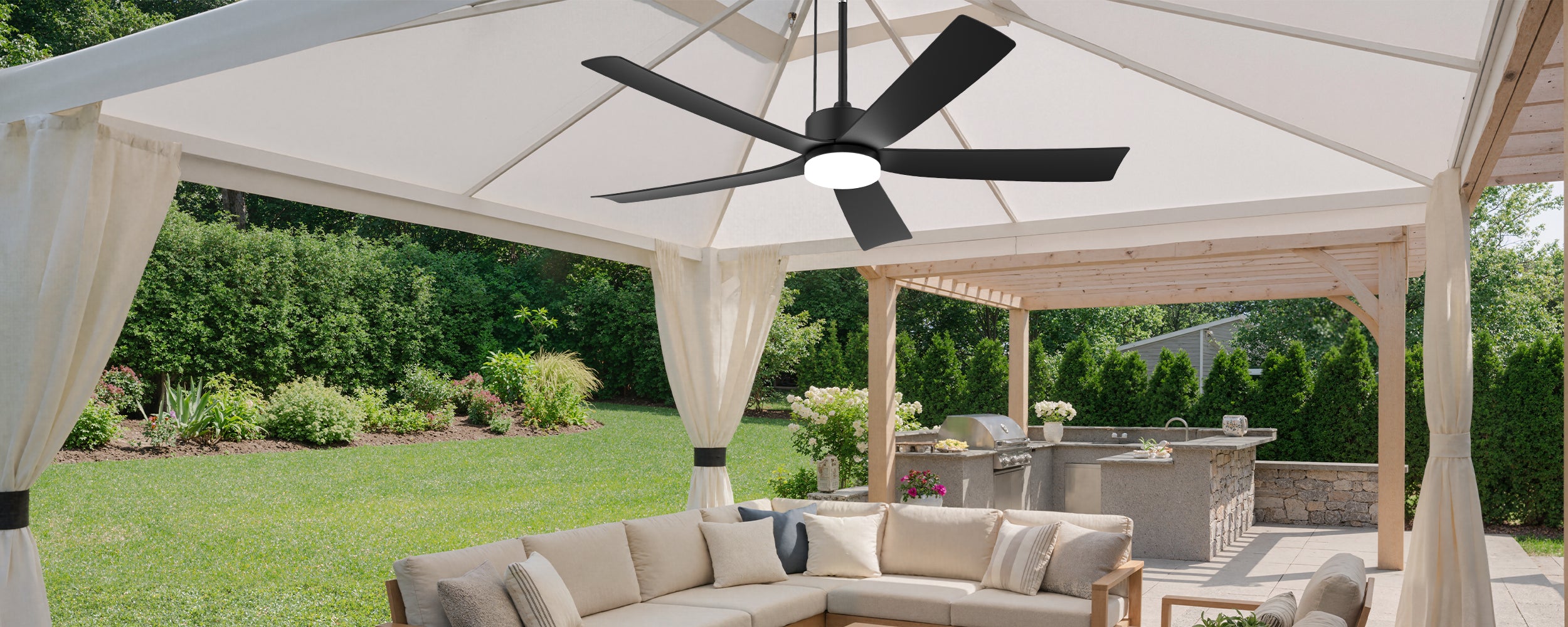 52 inch solar ceiling fan with light installed in backyard gazebo near outdoor kitchen