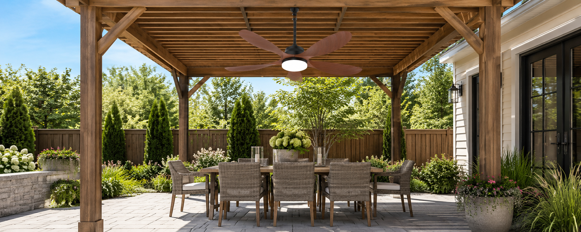 Separate ceiling fan and string lights installed in a pergola for customized outdoor lighting