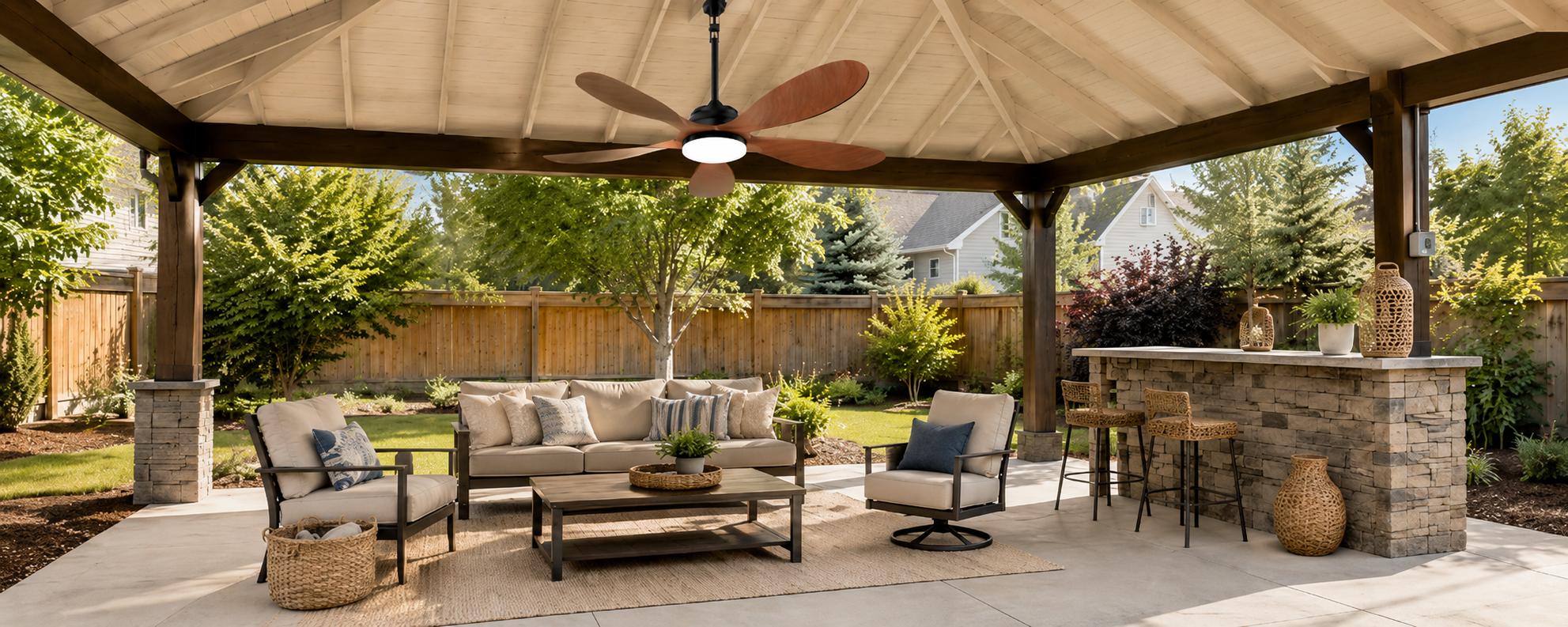 American homeowners gathering beneath a solar ceiling fan in a backyard pavilion
