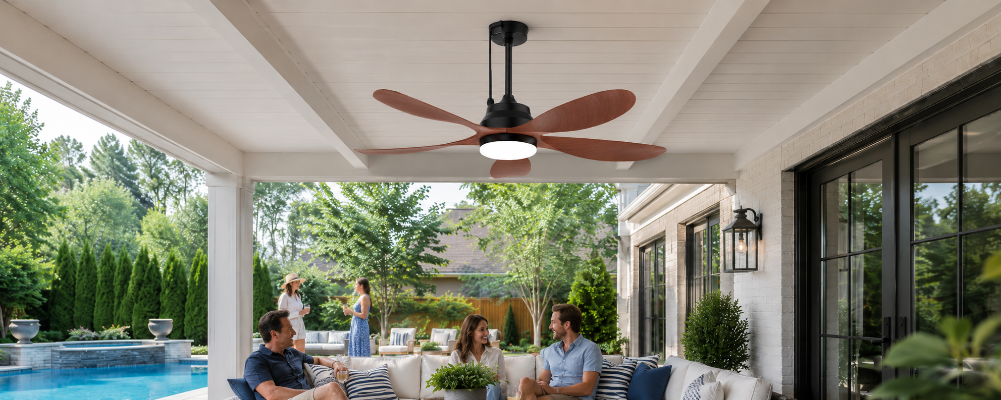 Wood blade solar ceiling fan with light for a covered patio near a backyard pool