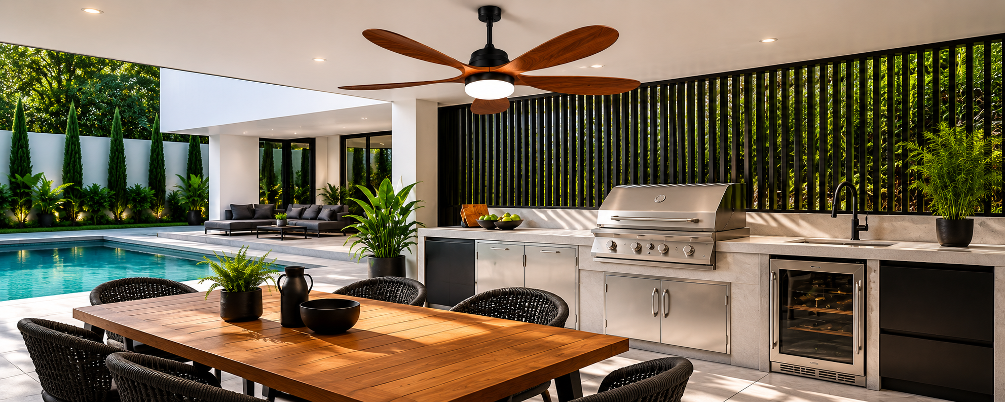 solar ceiling fan with light installed above a modern outdoor kitchen patio