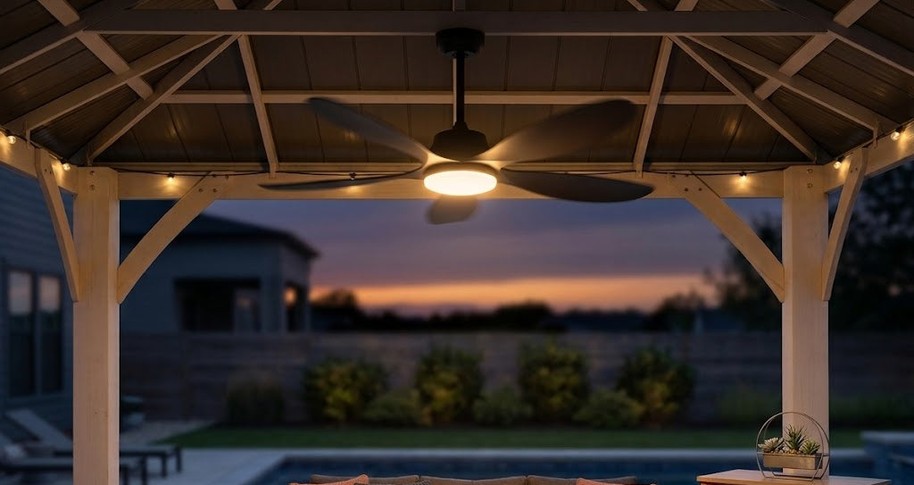 Solar ceiling fan with battery backup keeping a covered patio comfortable after sunset